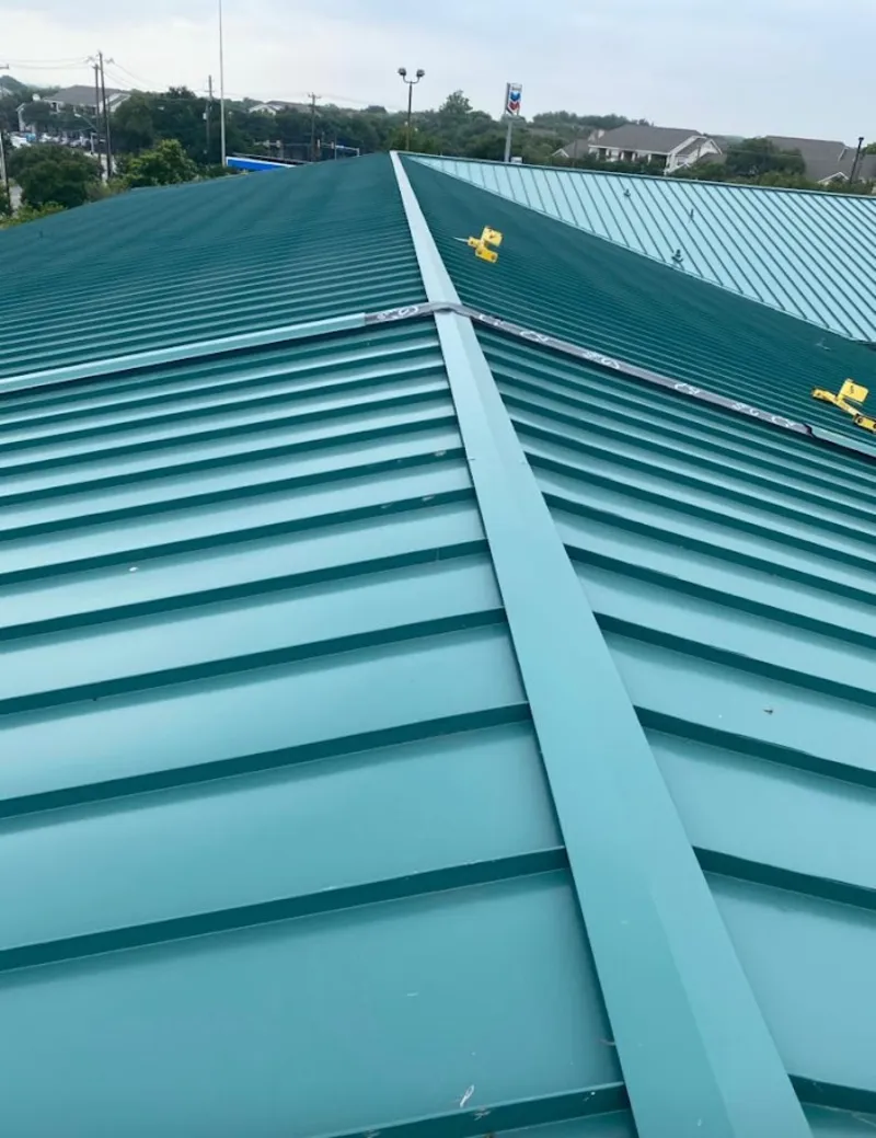 Green commercial metal roof ridge and valley for Metal Roof Repair in East Wenatchee